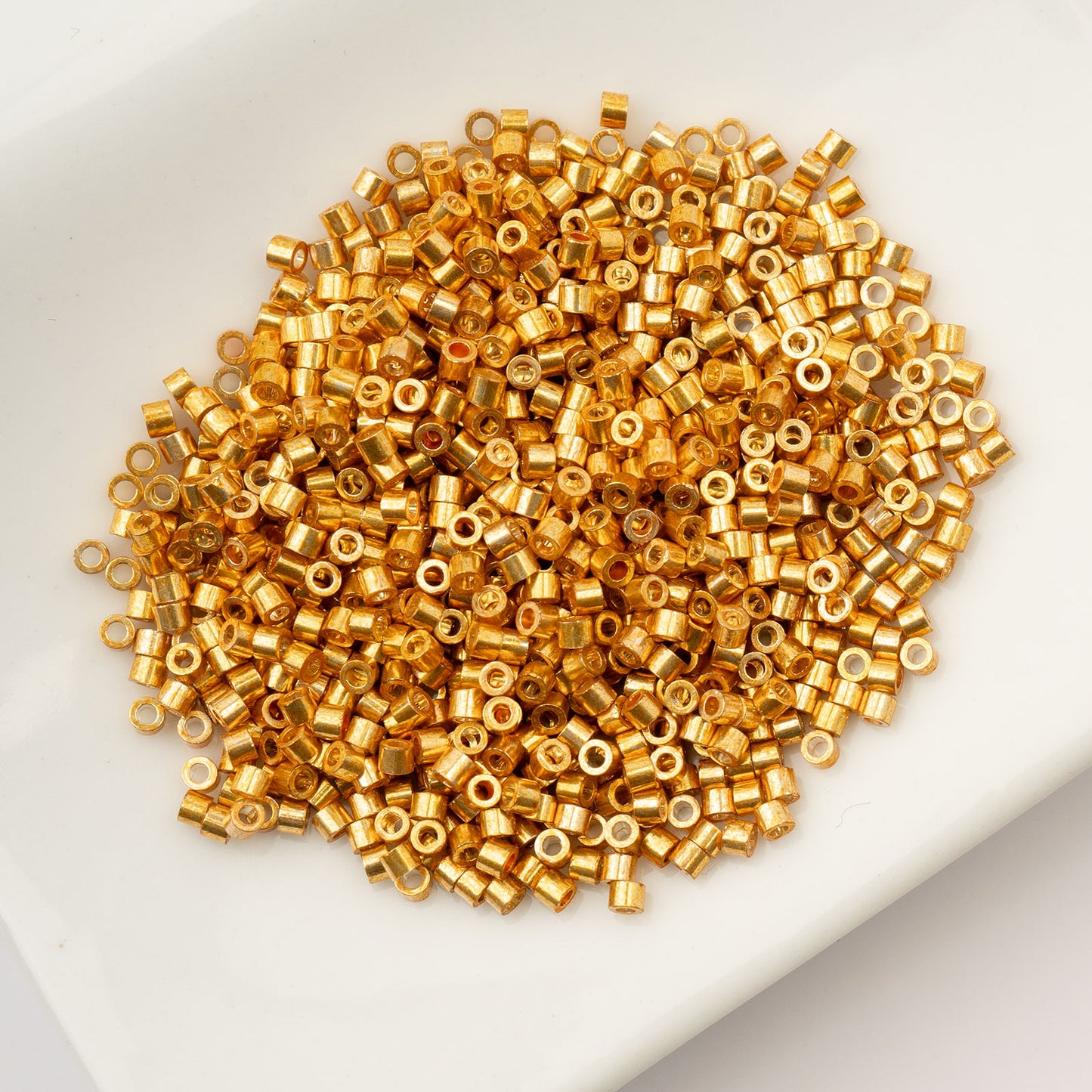 CYLIN BEAD 11/0 25G BAG GOLD AB