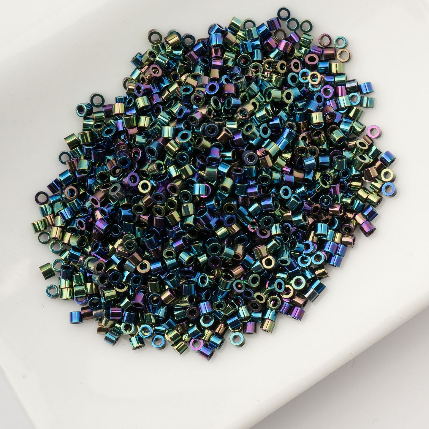 CYLIN BEAD 11/0 25G BAG BLACK AB