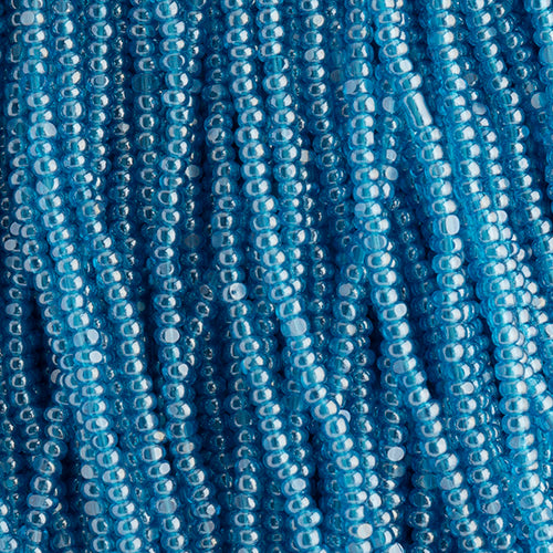 CZECH SEED BEADS 15/0 CUT APX100G TRANSPARENT CAPRI BLUE LUSTER