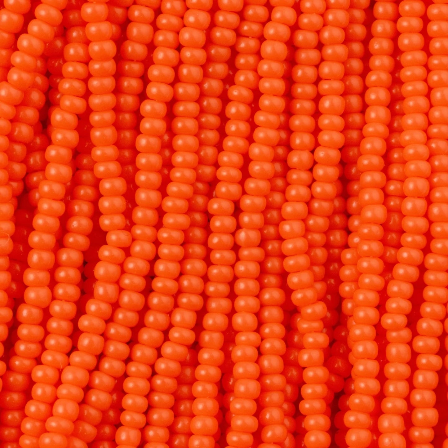 Czech Seed Beads, 11/0 – Opaque Orange (strung)