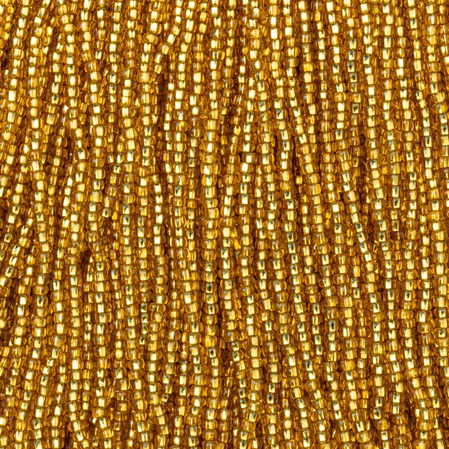 Czech Seed Beads, 11/0 – Silverlined Gold (strung)
