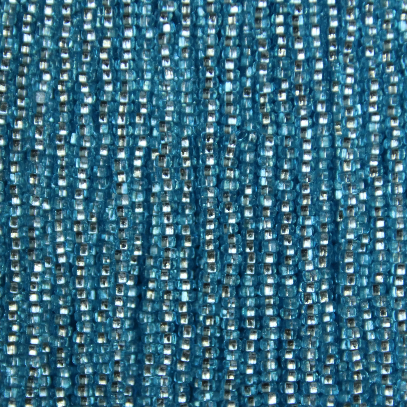 Czech Seed Beads, 11/0 – Silverlined Light aqua square hole (strung)