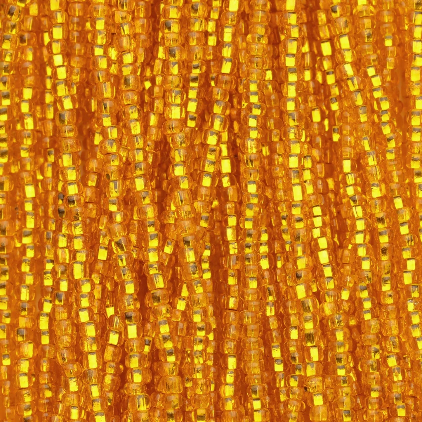 Czech Seed Beads, 11/0 – Silverlined Dark Yellow (strung)