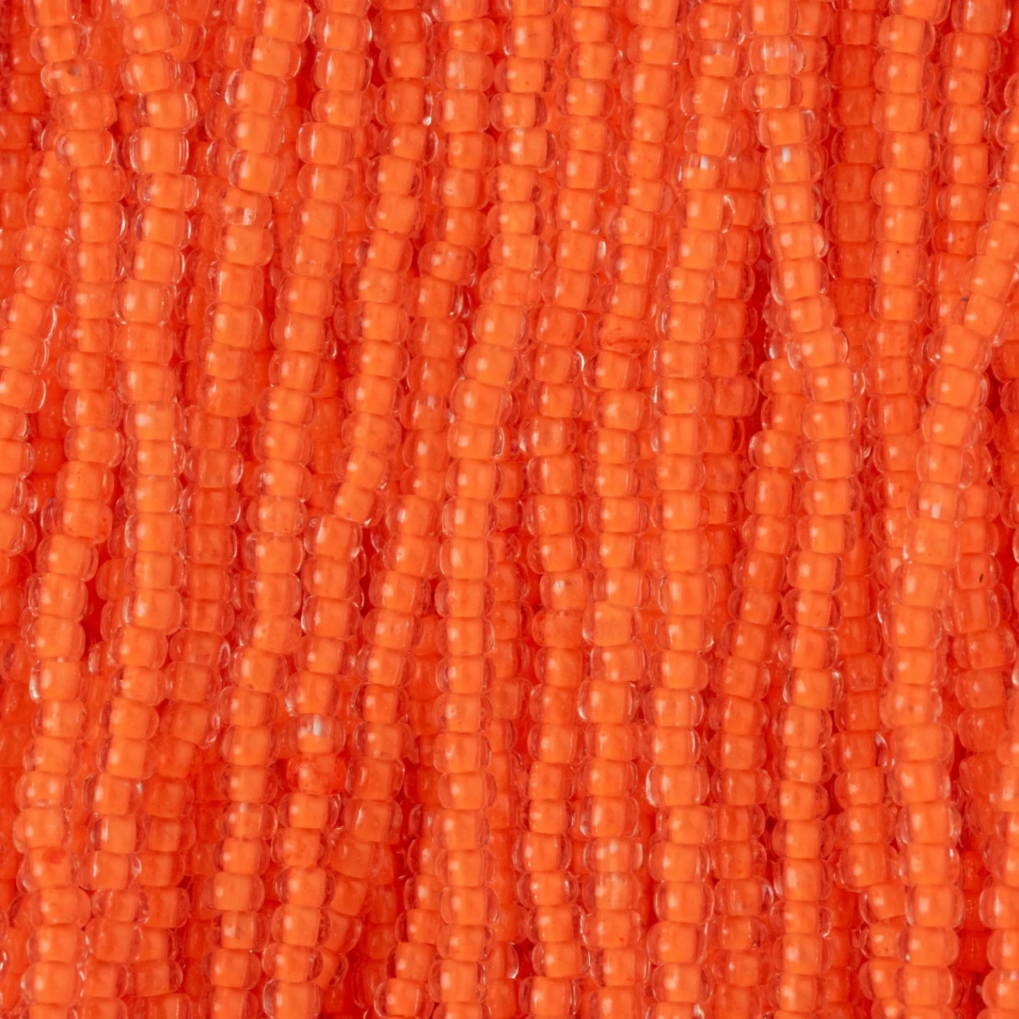 Czech Seed Beads, 11/0 – Transparent Neon Orange (strung)