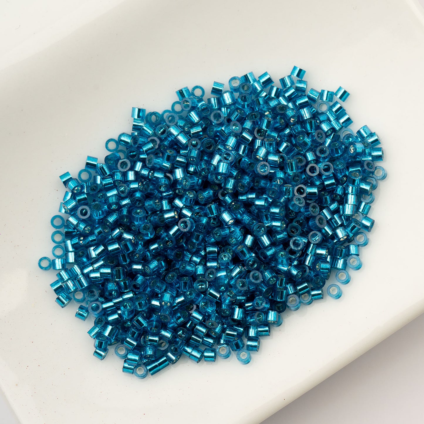 CYLIN BEAD 11/0 25G BAG CAPRI BLUE S/L