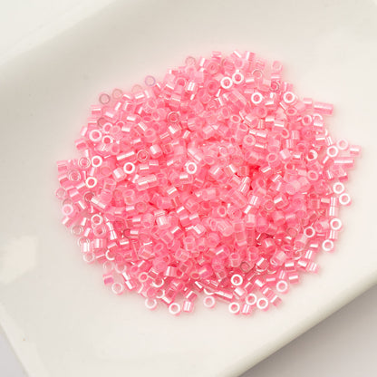 CYLIN BEAD 11/0 25G BAG DARK CRYSTAL PINK LINED CEYLON