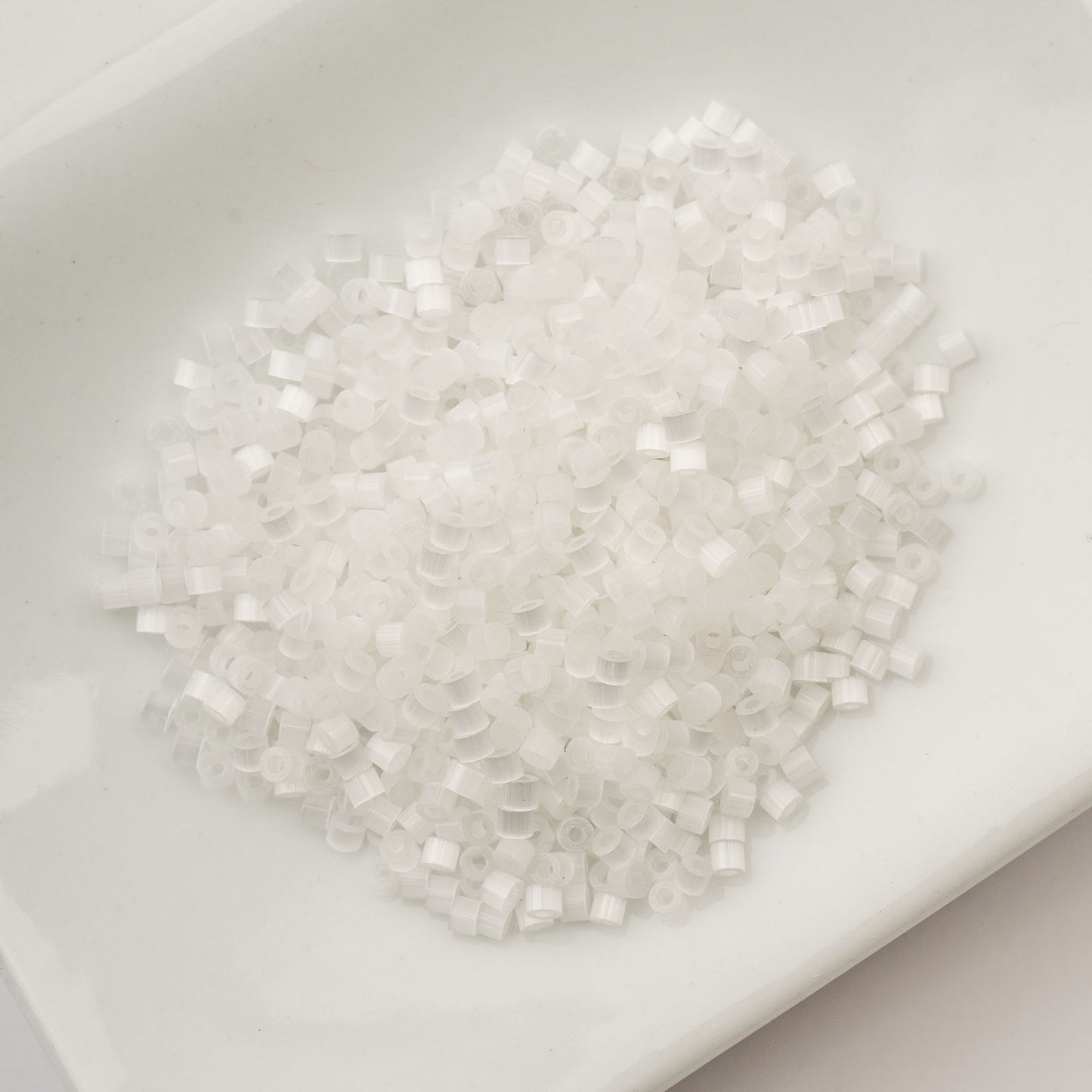 CYLIN BEAD 11/0 25G BAG CRYSTAL SILK SATIN