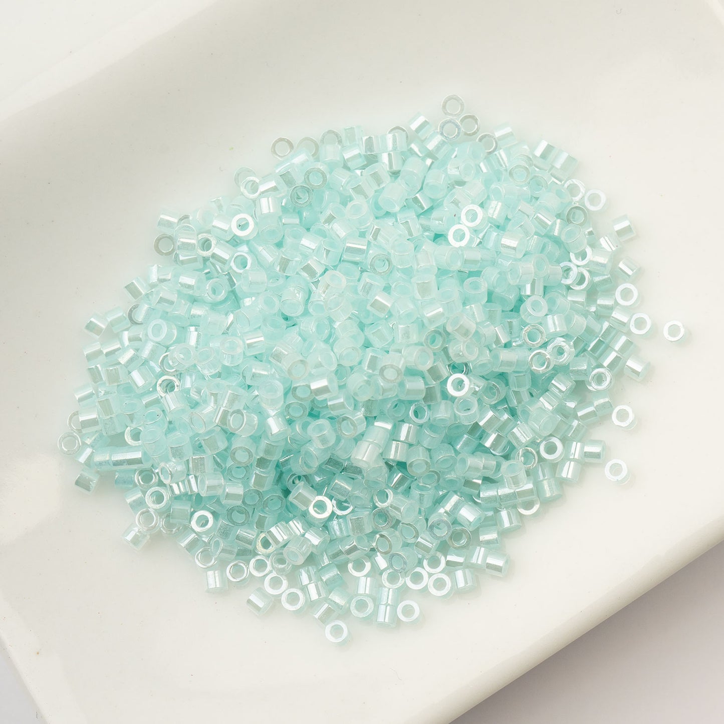 CYLIN BEAD 11/0 25G BAG LIGHT CRYSTAL AQUA CEYLON