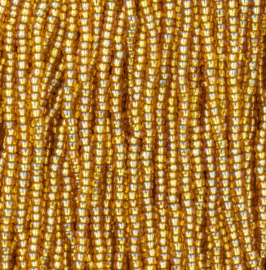 Czech Seed Beads, 11/0 – Silverlined Rainbow Dark Gold (topaz) (strung)