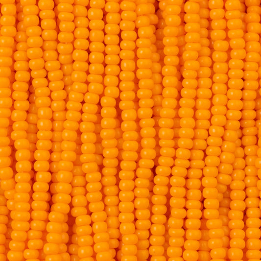 Czech Seed Beads, 11/0 – Opaque Light Orange (strung)