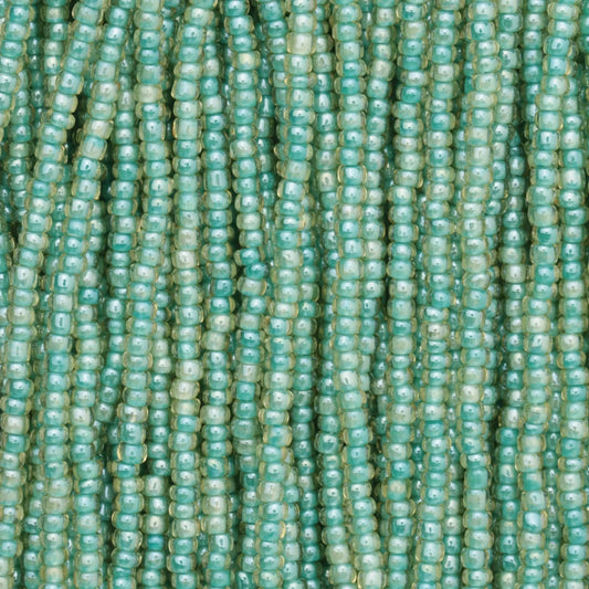 Czech Seed Beads, 11/0 – Colourlined Topaz Green Lined (strung)